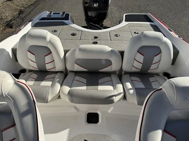 Slide: The Image of 2018 Nitro Z19 Sport boat interior with gray and white seating, featuring red accents. - 26