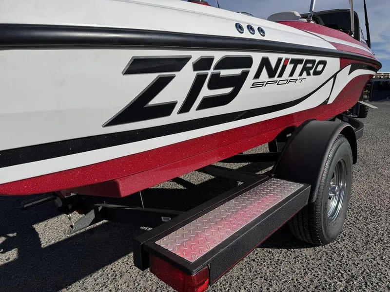 Slide: The Image of 2018 Nitro Z19 Sport boat on trailer, featuring bold graphics and sleek design. - 44