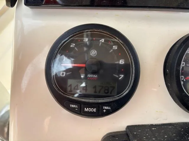 Slide: The Image of Tachometer of 2022 Scout 215 XSF boat displaying RPM and mode settings. - 27
