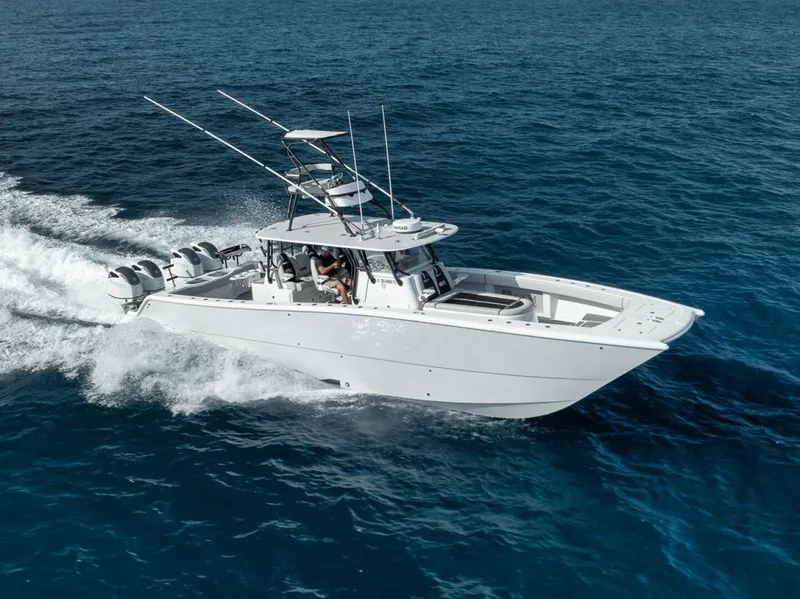 Slide: The Image of 2019 Freeman 42LR boat cruising on open ocean waters. - 0