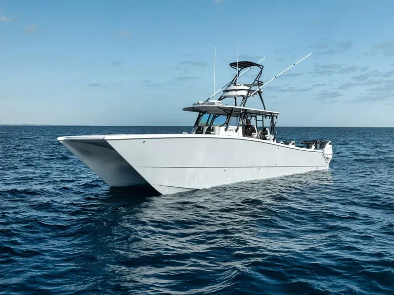 Slide: The Image of 2019 Freeman 42LR boat on open sea under clear sky. - 10