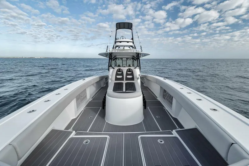 Slide: The Image of 2019 Freeman 42LR boat on open sea under cloudy sky. - 14