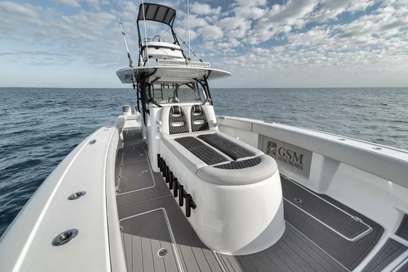 Slide: The Image of 2019 Freeman 42LR boat on open sea under cloudy sky. - 17