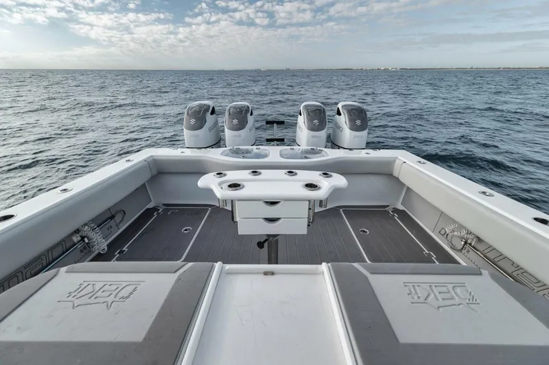 Slide: The Image of Freeman 42LR 2019 boat deck with four engines on open water. - 27