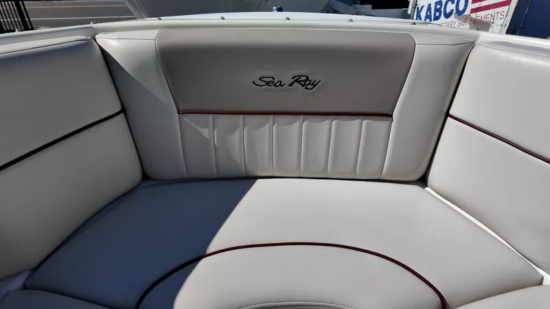 Slide: The Image of White leather seating on a 2005 Sea Ray 270 Select EX boat. - 16