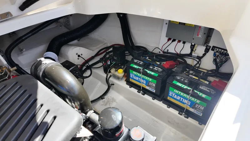 Slide: The Image of Engine compartment of a 2005 Sea Ray 270 Select EX with Interstate batteries. - 24