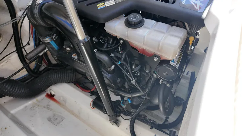 Slide: The Image of Engine compartment of a 2005 Sea Ray 270 Select EX boat. - 25