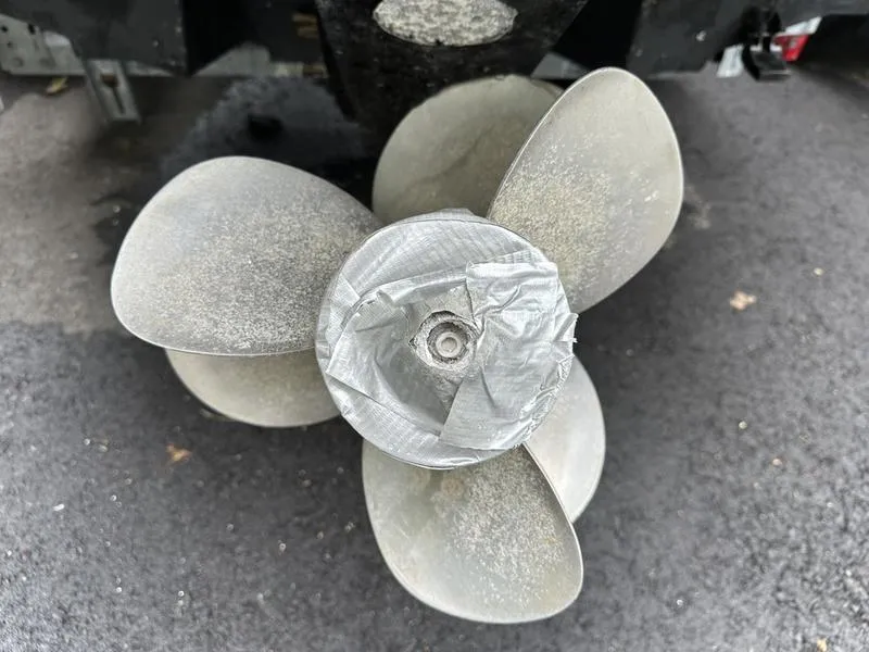 Slide: The Image of Propeller of a 2006 Sea Ray 220 Sundeck with duct tape on the hub. - 15