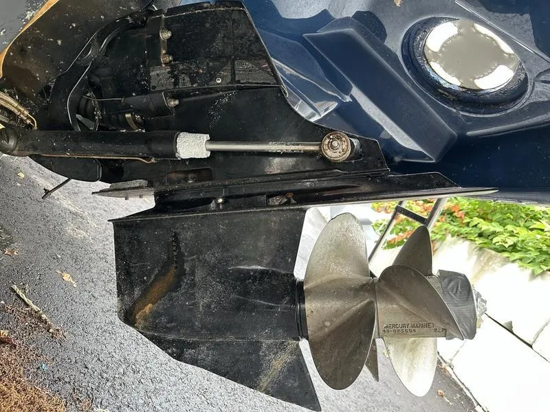 Slide: The Image of Close-up of 2006 Sea Ray 220 Sundeck boat propeller and stern drive. - 16