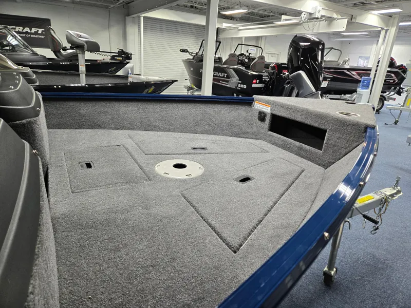 Slide: The Image of 2025 Princecraft Holiday 162 WS MAX boat interior, showcasing spacious deck and modern design. - 6