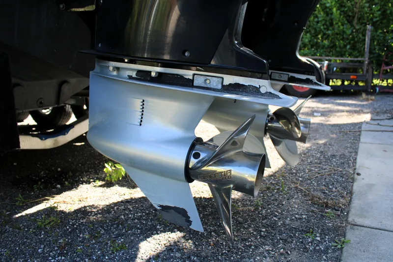 Slide: The Image of Propeller of a 2008 Edgewater 318CC boat on gravel surface. - 12