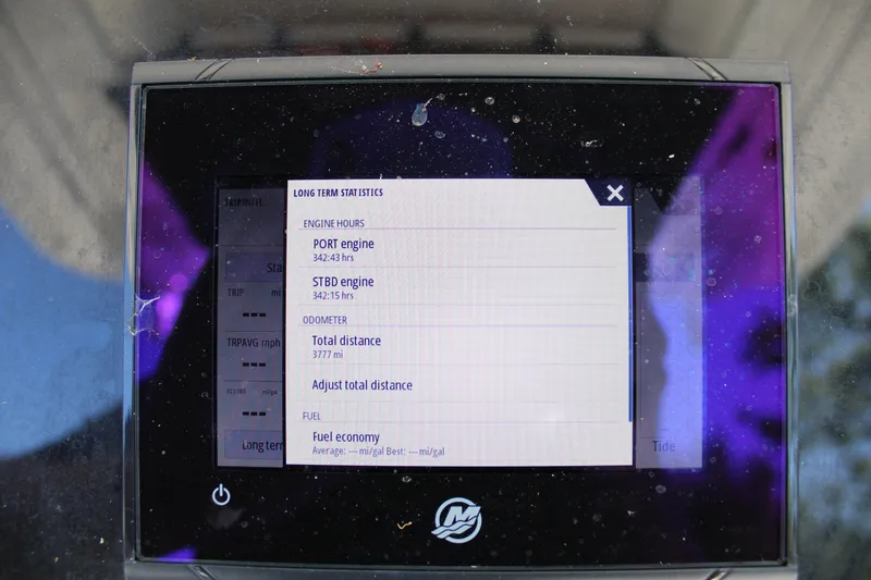 Slide: The Image of Display screen showing long-term statistics for a 2008 Edgewater 318CC boat. - 24