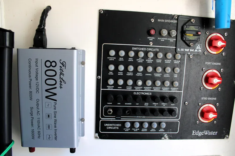 Slide: The Image of Electrical panel and inverter on a 2008 Edgewater 318CC boat. - 27