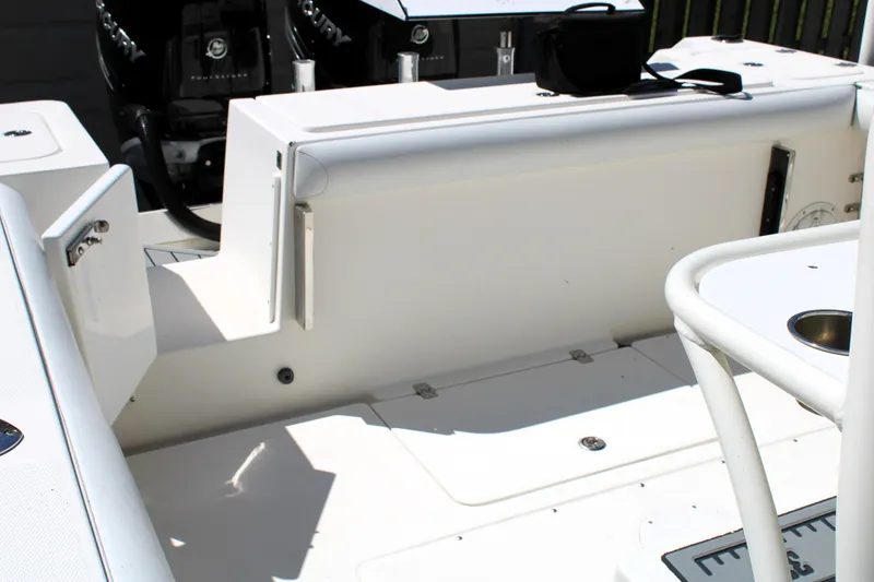 Slide: The Image of 2008 Edgewater 318CC boat interior with seating and control panel. - 35