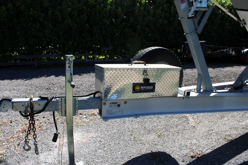 Slide: The Image of Trailer hitch with toolbox on 2008 Edgewater 318CC boat trailer. - 4