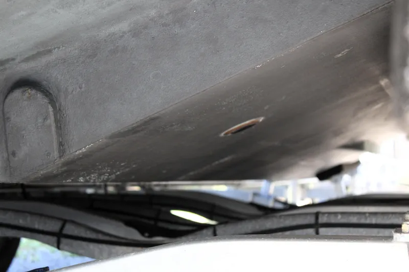 Slide: The Image of Underside view of a 2008 Edgewater 318CC boat hull. - 9