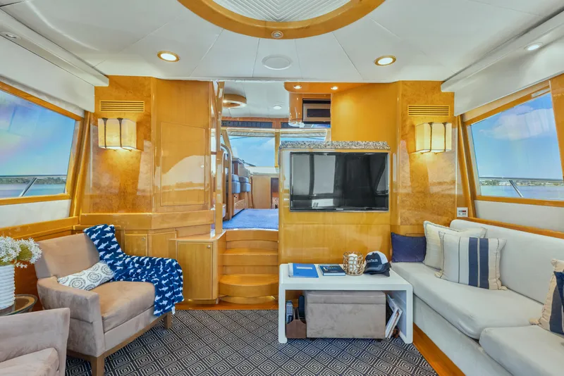 Slide: The Image of Luxurious interior of 2003 McKinna 58 Pilothouse yacht with modern furnishings and large windows. - 19
