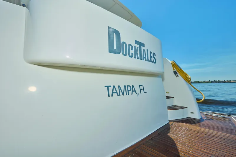 Slide: The Image of 2003 McKinna 58 Pilothouse yacht named "DockTales" docked in Tampa, FL. - 2
