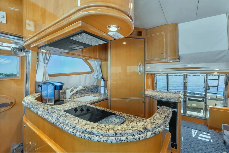 Slide: The Image of Luxurious 2003 McKinna 58 Pilothouse yacht interior with modern kitchen and ocean view. - 25
