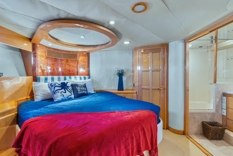 Slide: The Image of Luxurious 2003 McKinna 58 Pilothouse bedroom with elegant decor and ensuite bathroom. - 33