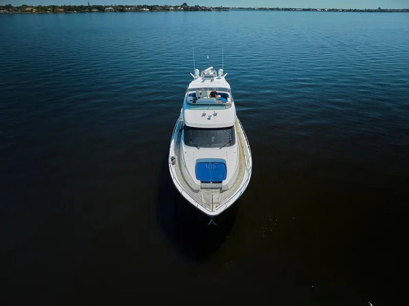 Slide: The Image of 2003 McKinna 58 Pilothouse yacht cruising on calm waters. - 38