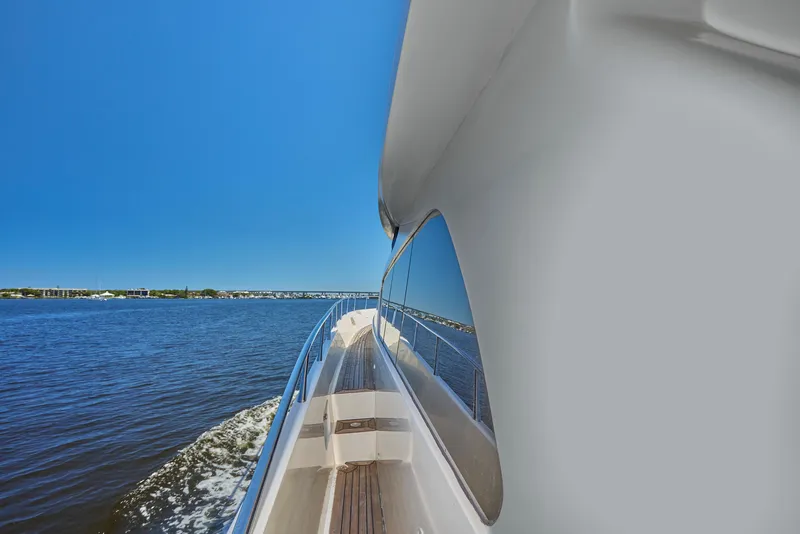 Slide: The Image of 2003 McKinna 58 Pilothouse yacht cruising on a sunny day. - 6