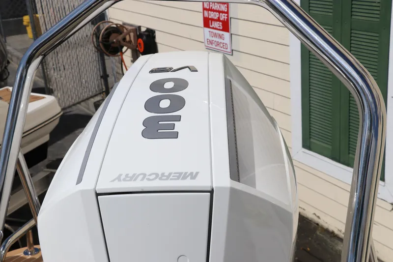 Slide: The Image of Outboard motor on 2025 Nimbus Tender 8 boat, featuring Mercury 300 V8 engine. - 11