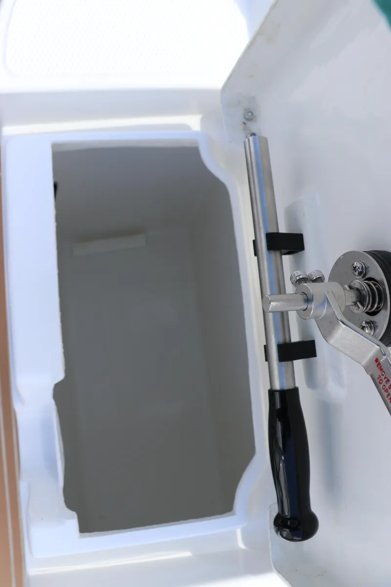 Slide: The Image of 2025 Nimbus Tender 8 boat compartment with hydraulic lift mechanism. - 14