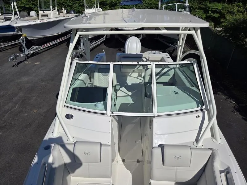 Slide: The Image of 2025 Sailfish 245 DC boat with sleek design and spacious seating. - 12