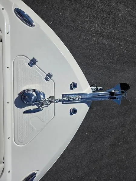 Slide: The Image of Bow of 2025 Sailfish 245 DC boat with anchor and chain on deck. - 17