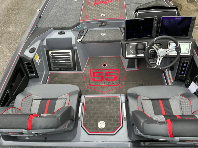 Slide: The Image of 2023 Ranger Z521R boat interior with dual seats, steering wheel, and electronic displays. - 10