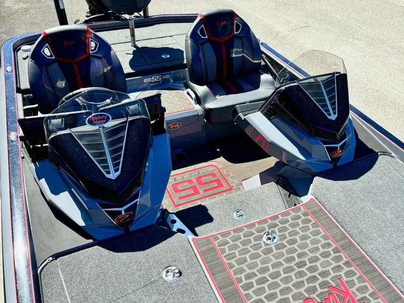 Slide: The Image of 2023 Ranger Z521R boat interior with dual seats and sleek dashboard design. - 8