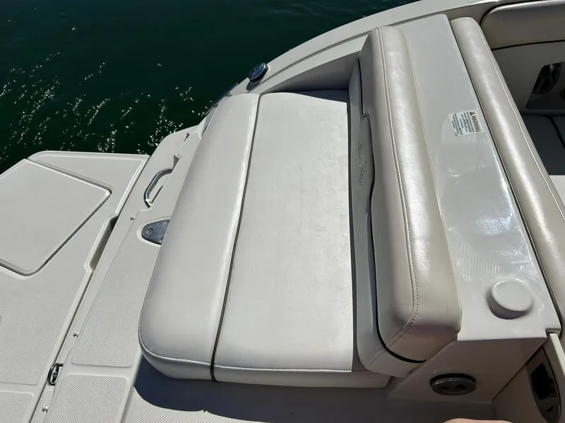 Slide: The Image of 2008 Sea Ray 290 Sundeck boat with white seating and swim platform. - 21