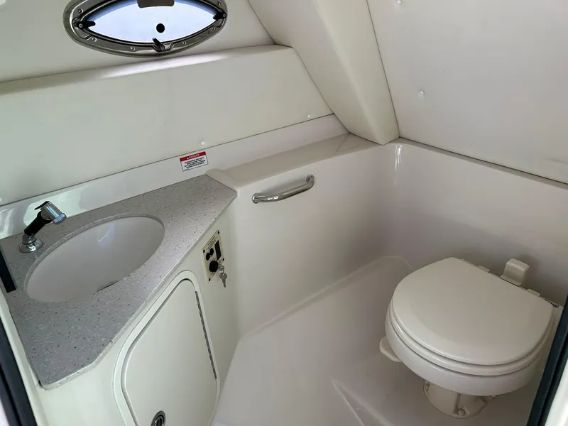 Slide: The Image of 2008 Sea Ray 290 Sundeck boat bathroom with sink and toilet. - 43