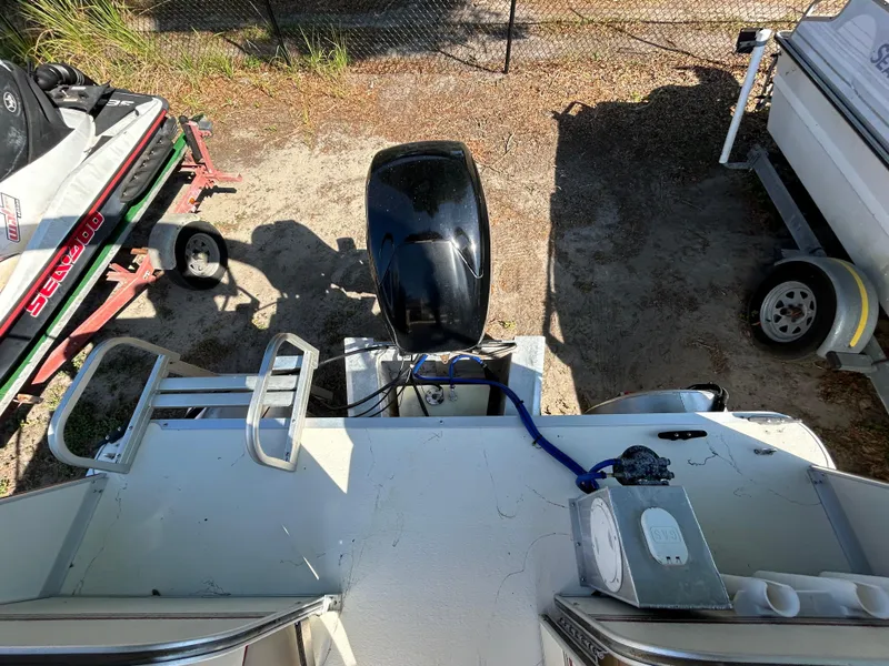 Slide: The Image of 2008 Fiesta Fish n Fun 16 Deluxe boat, top view of motor and deck area. - 10