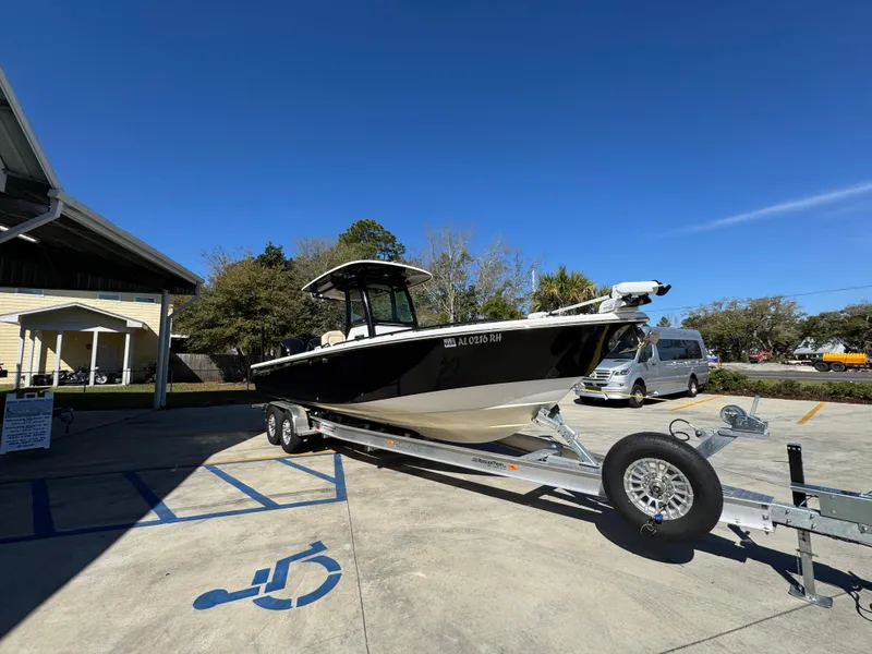Slide: The Image of 2017 Everglades 273 Center Console boat on trailer in parking lot. - 10