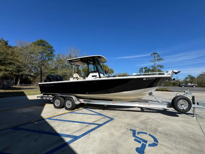 Slide: The Image of 2017 Everglades 273 Center Console boat on trailer in parking lot. - 12