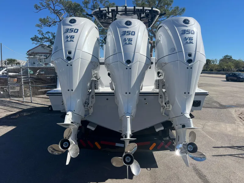 Slide: The Image of Triple 350 V6 outboard engines on a 2025 Contender 35 ST boat. - 16