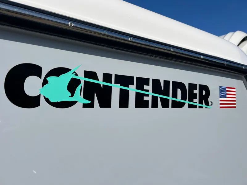 Slide: The Image of 2025 Contender 35 ST logo with marlin and American flag on boat exterior. - 6