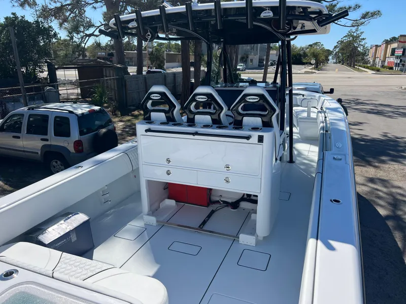 Slide: The Image of 2025 Contender 35 ST boat with sleek design and modern seating arrangement. - 7