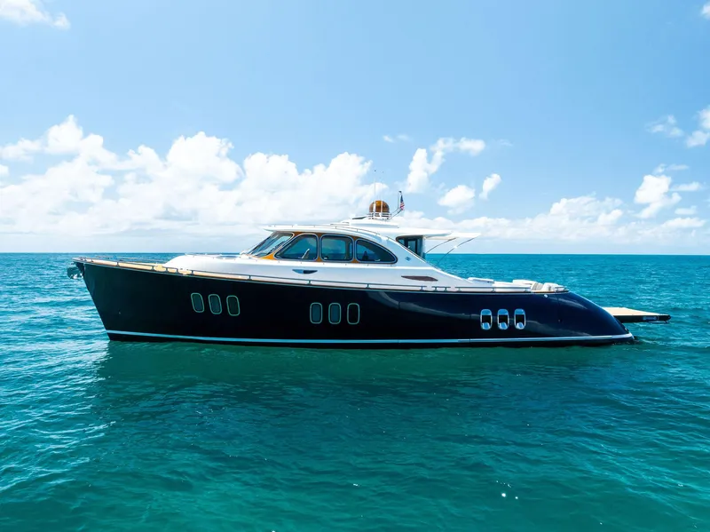 Slide: The Image of Luxurious 2019 Zeelander 55 yacht cruising on clear blue ocean waters. - 1