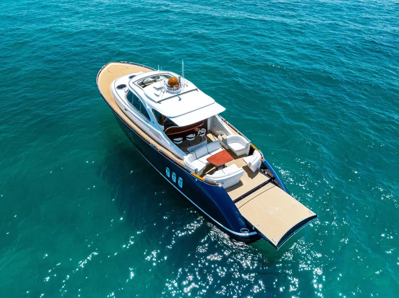 Slide: The Image of Luxurious 2019 Zeelander 55 yacht cruising on clear blue ocean waters. - 10