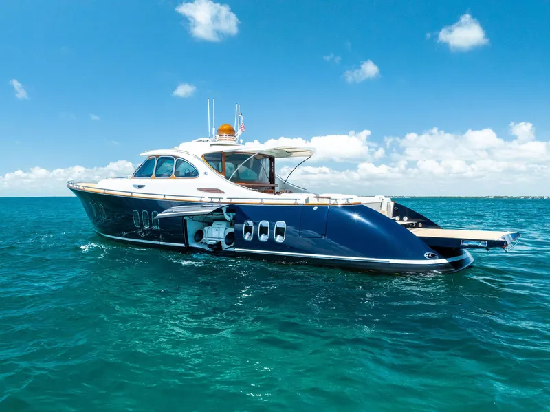Slide: The Image of 2019 Zeelander 55 yacht cruising on clear blue ocean under a bright sky. - 11