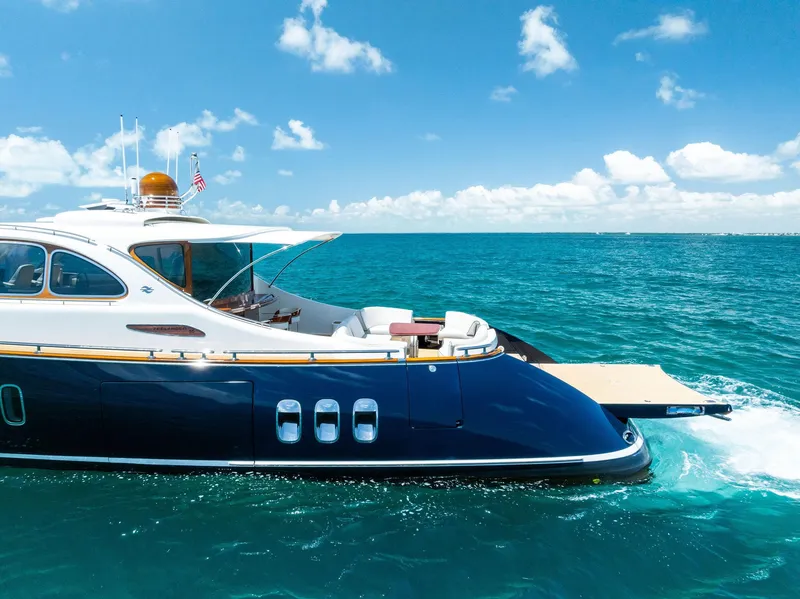 Slide: The Image of Luxurious 2019 Zeelander 55 yacht cruising on clear blue ocean waters. - 12