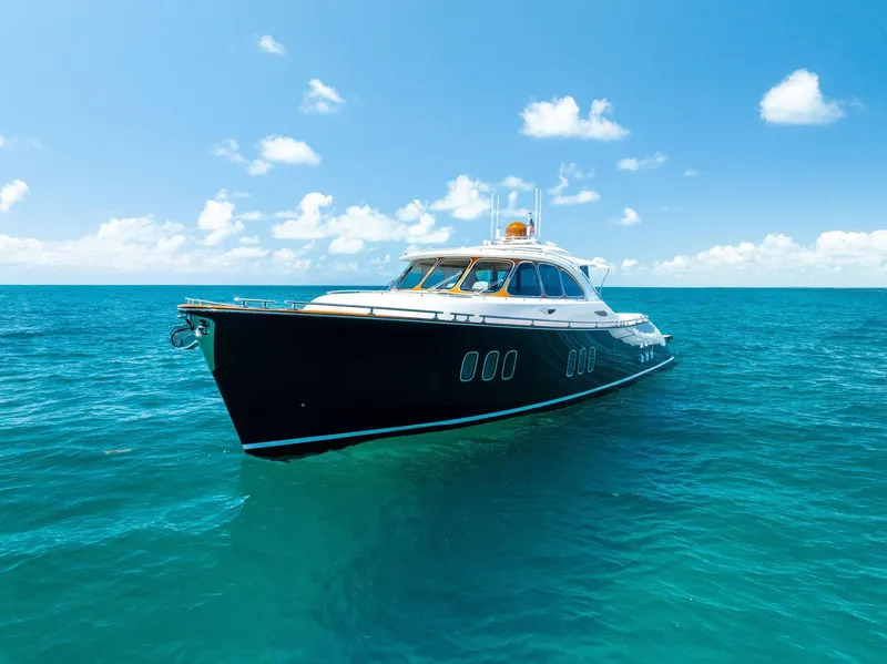 Slide: The Image of Luxurious 2019 Zeelander 55 yacht cruising on clear blue ocean waters. - 2