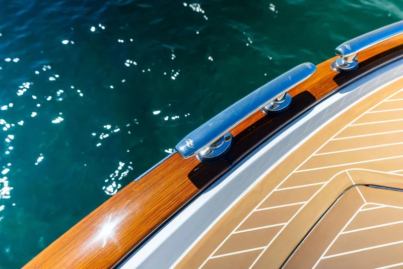 Slide: The Image of Zeelander 55 yacht deck detail, 2019 model, with polished wood and stainless steel accents. - 28