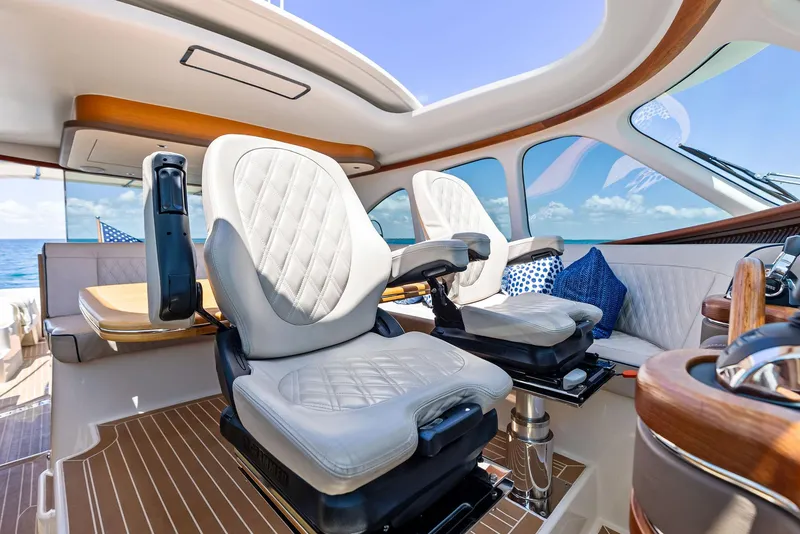Slide: The Image of Luxurious interior of 2019 Zeelander 55 yacht with elegant seating and panoramic windows. - 31