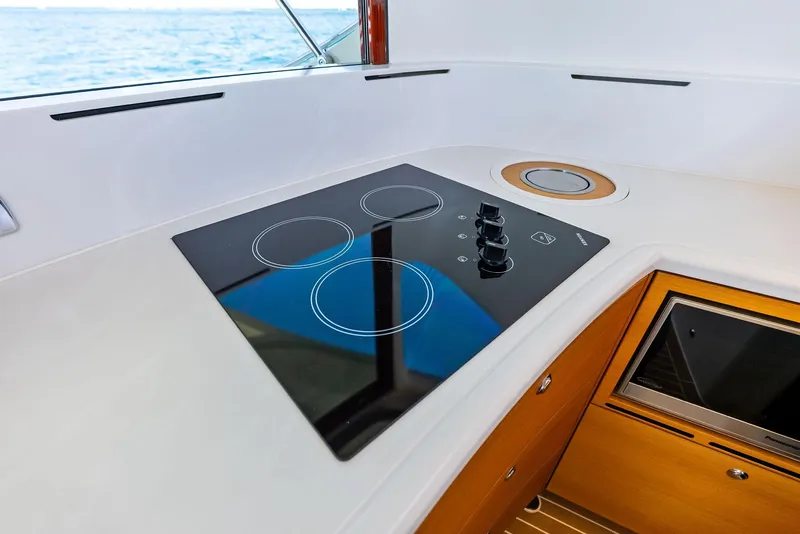 Slide: The Image of Modern kitchen on 2019 Zeelander 55 yacht with stovetop and oven. - 38