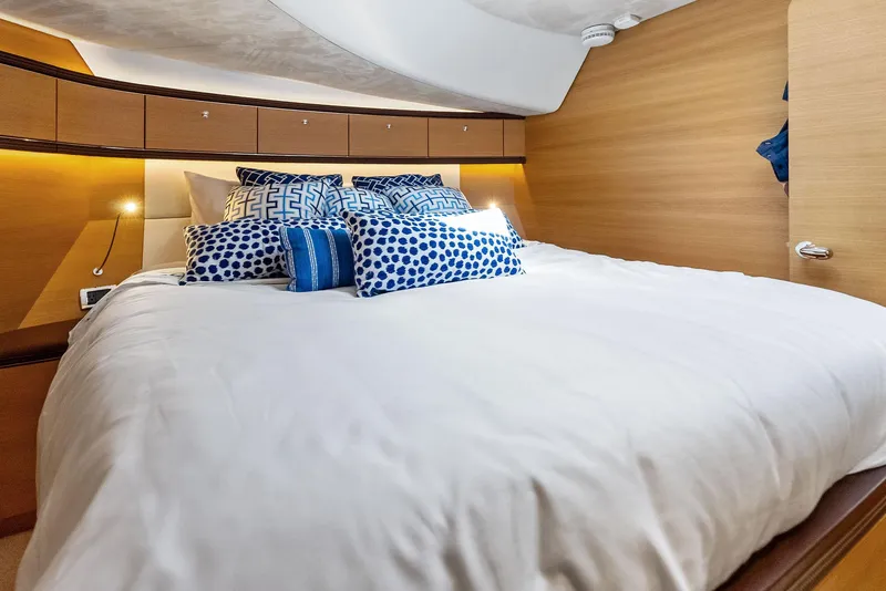 Slide: The Image of Luxurious bedroom interior of 2019 Zeelander 55 yacht with plush bedding and modern design. - 44
