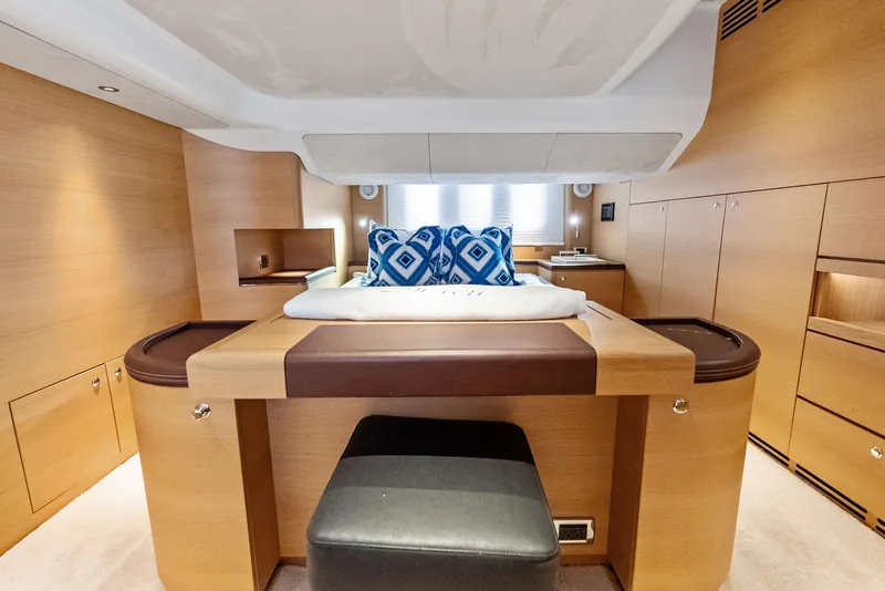 Slide: The Image of Luxurious interior of 2019 Zeelander 55 yacht with modern wood finish and elegant bedding. - 46